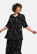 Blusa 'Noira' – ligera, minimalista y expresiva
